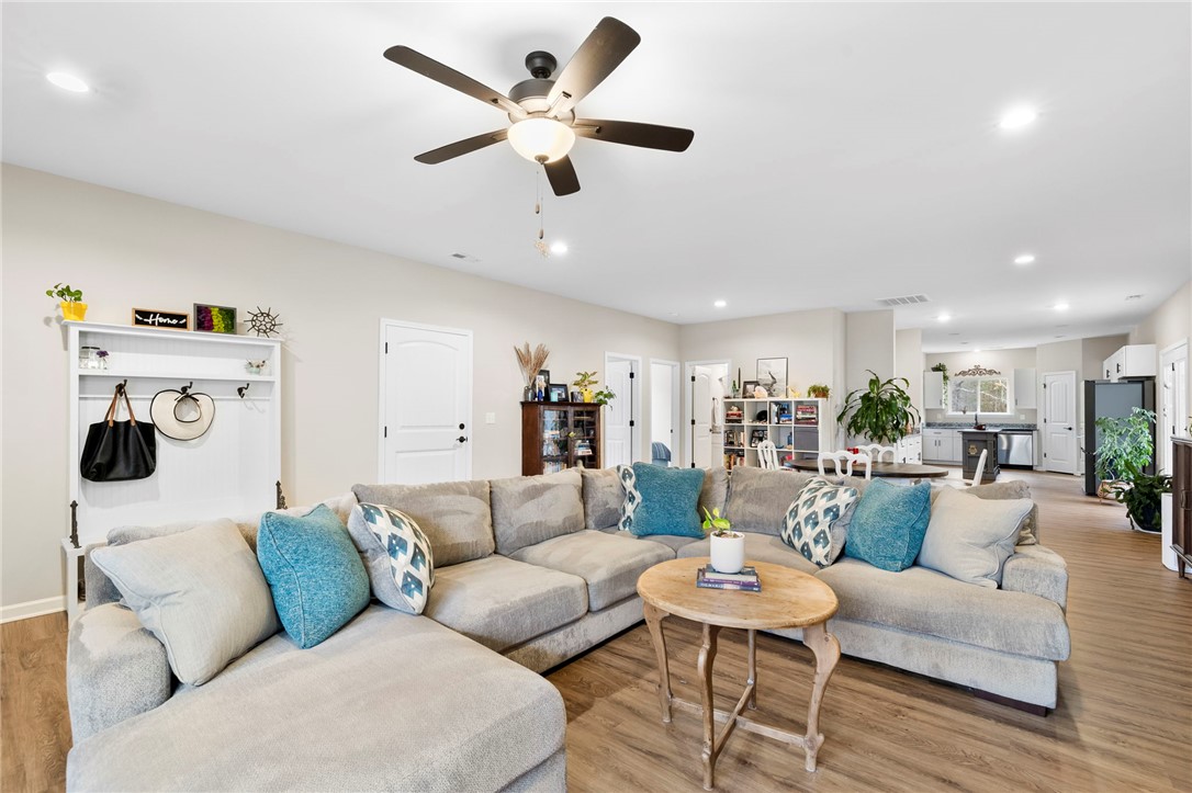 102 Colonial Court Pendleton, SC 29670 - Photo 7 of 30 This bright living space features an open layout, ideal for relaxation and everyday living.