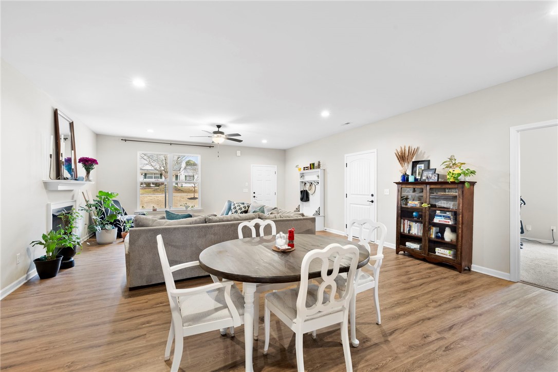 102 Colonial Court Pendleton, SC 29670 - Photo 9 of 30 This inviting space features an open layout with durable flooring, perfect for comfortable everyday living.