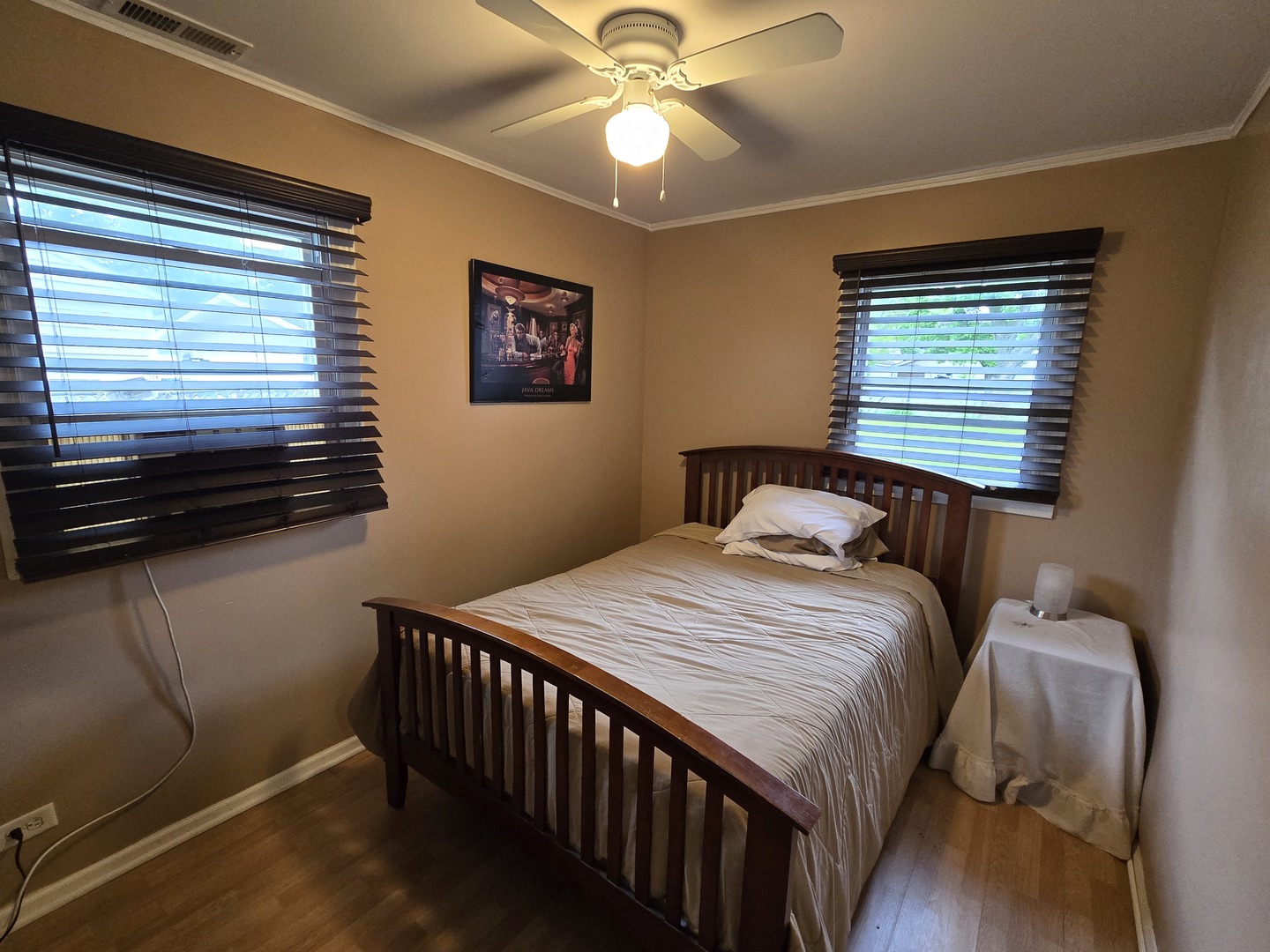 14932 Kedvale Avenue Midlothian, IL 60445 - Photo 9 of 17 a bedroom with a bed and a chandelier