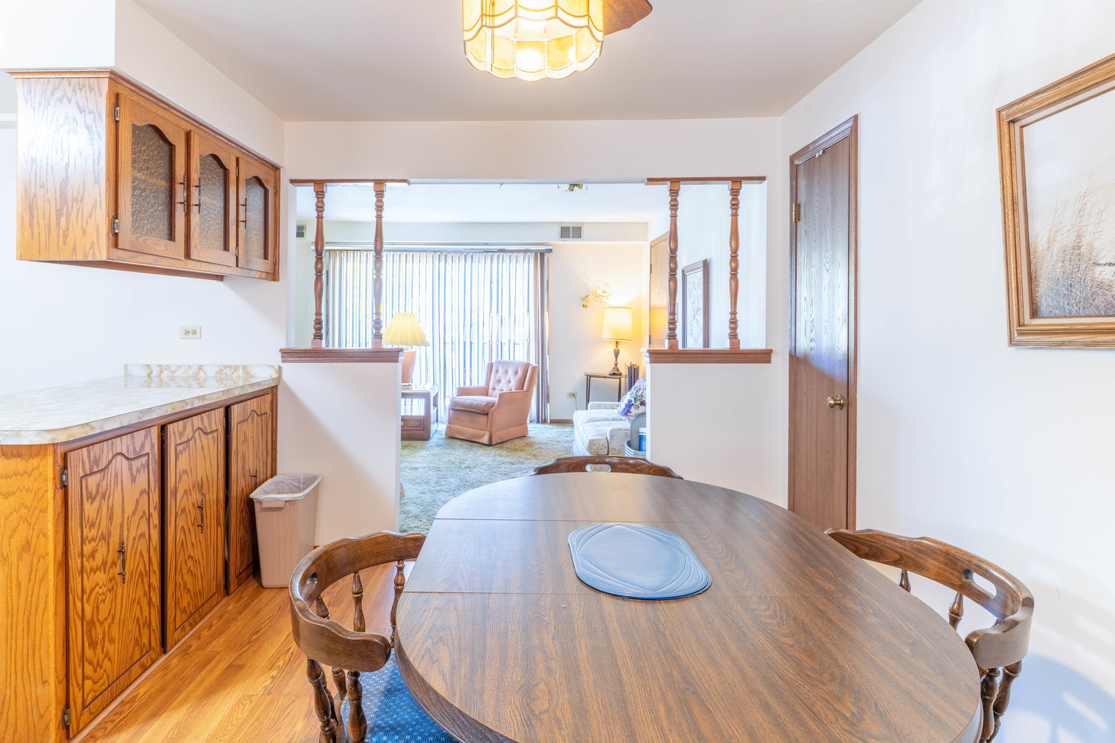 6401 West 64th Place, Unit 2W Chicago, IL 60638 - Photo 8 of 41 a view of a dining room with furniture and wooden floor