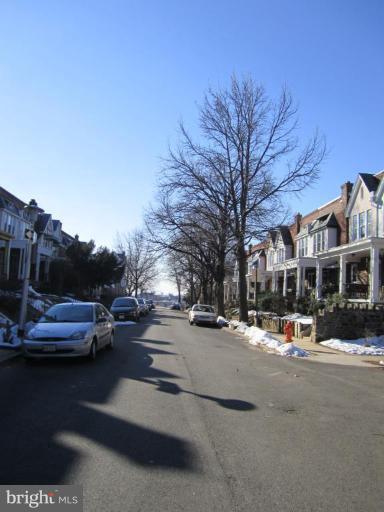 3629 Elkader Road Baltimore, MD 21218 - Photo 14 of 19 a view of a street with houses