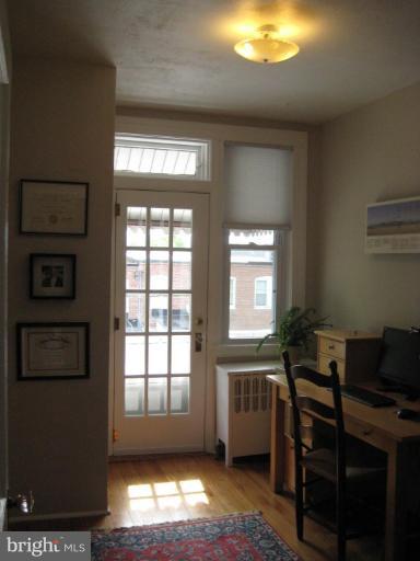 3629 Elkader Road Baltimore, MD 21218 - Photo 8 of 19 a workspace with furniture and window