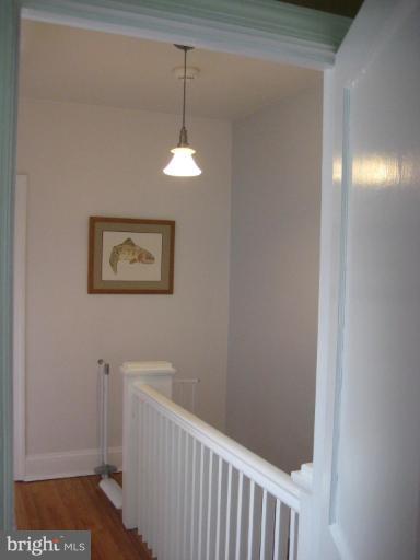 3629 Elkader Road Baltimore, MD 21218 - Photo 9 of 19 a view of a hallway with a white walls