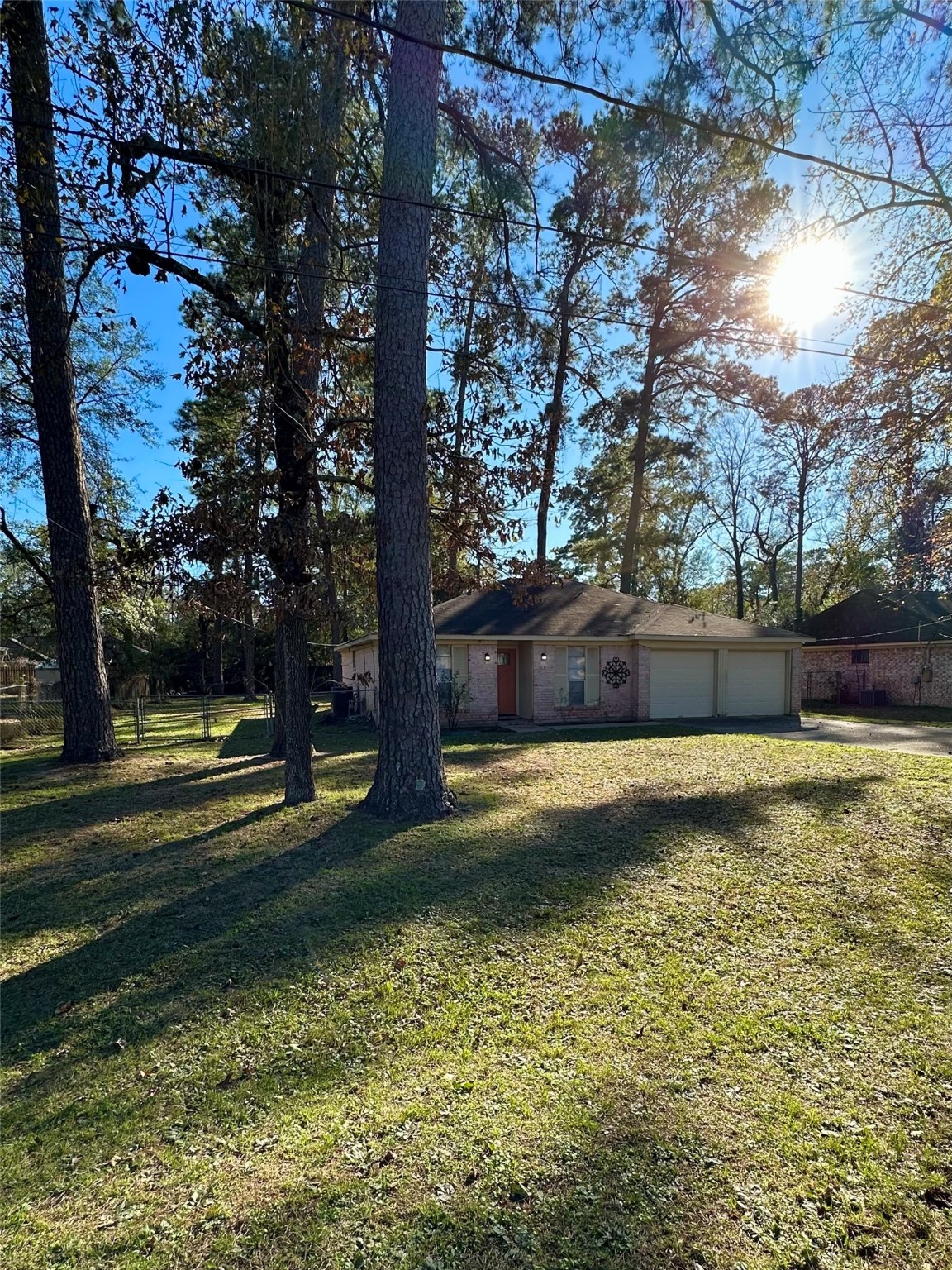 3223 Brooktree Lane Spring, TX 77380 - Photo 2 of 30 a view of a swimming pool with an outdoor space