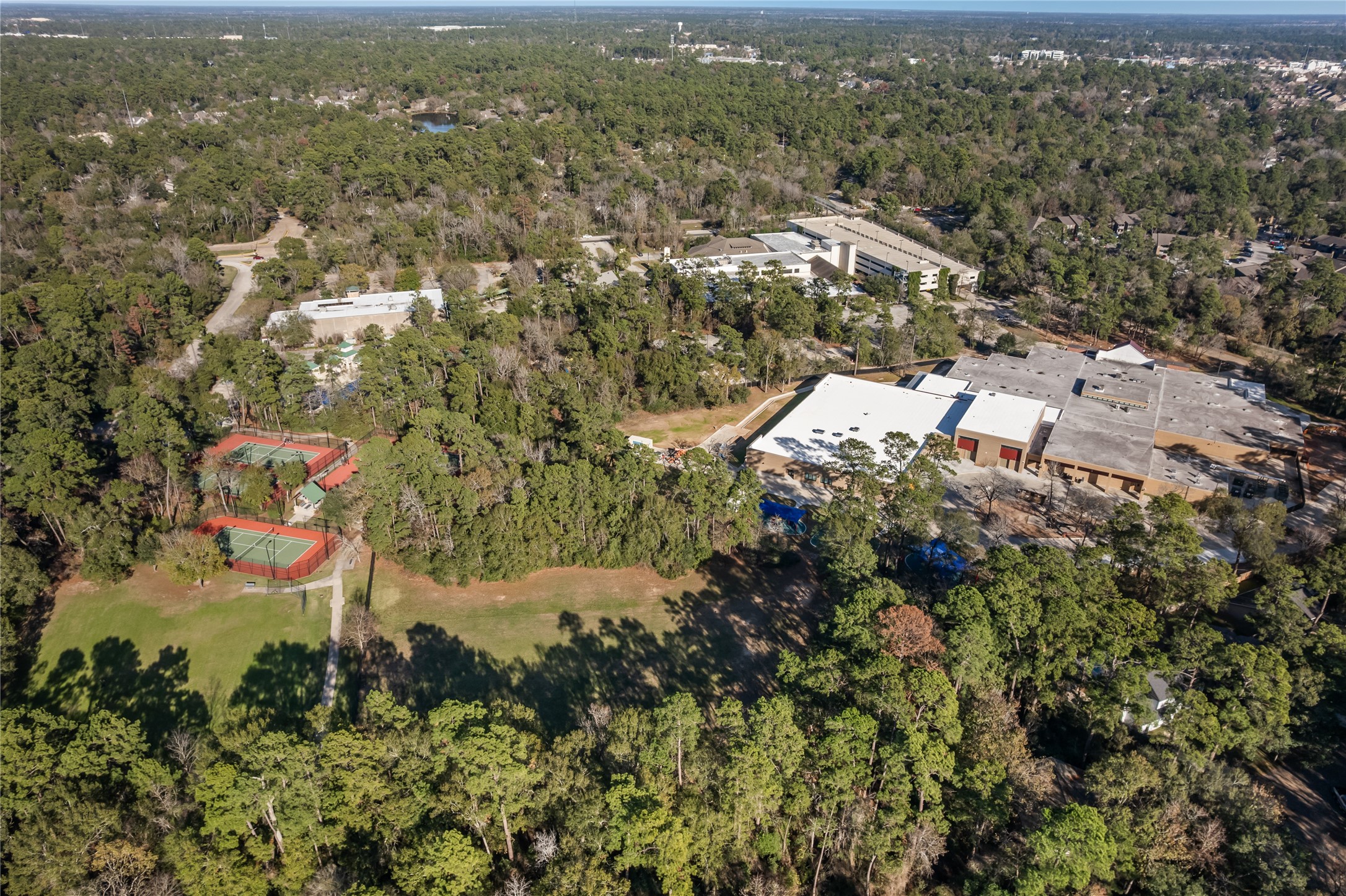3223 Brooktree Lane Spring, TX 77380 - Photo 30 of 30 an aerial view of residential house with parking and yard