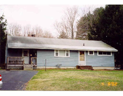 36 Birch Meadow Road Merrimac, MA 01860 - Photo 1 of 1 a front view of a house with garden