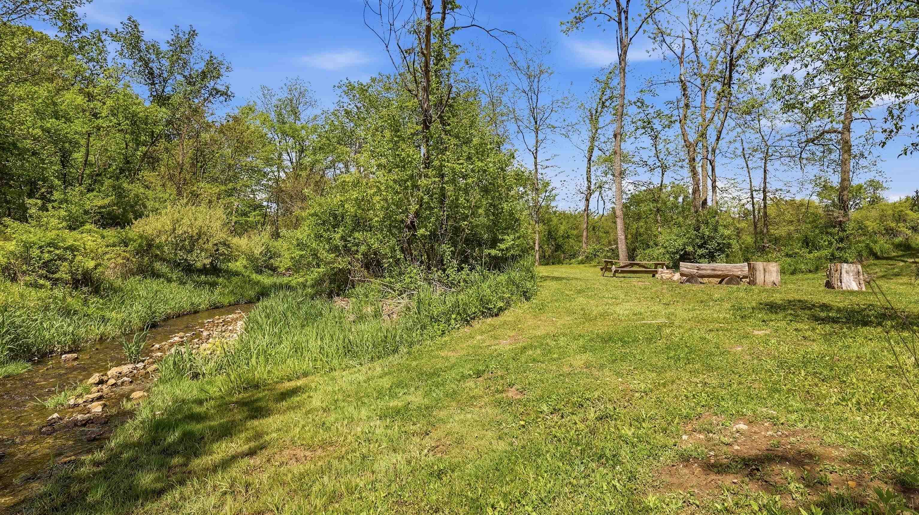 2562 West Blackjack Road Galena, IL 61036 - Photo 72 of 75 a view of outdoor space with trees all around