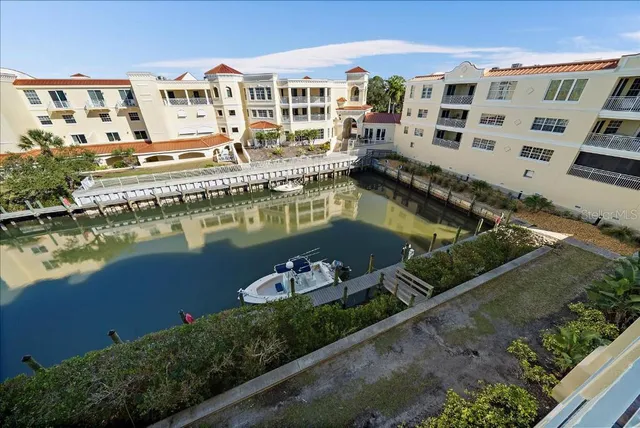 aerial view of a house with a lake view