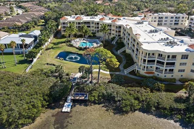 a view of a patio with chairs and plants