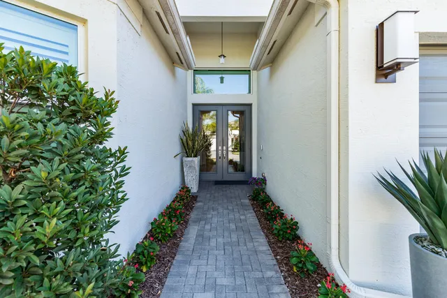 a bedroom with a bed window and couch