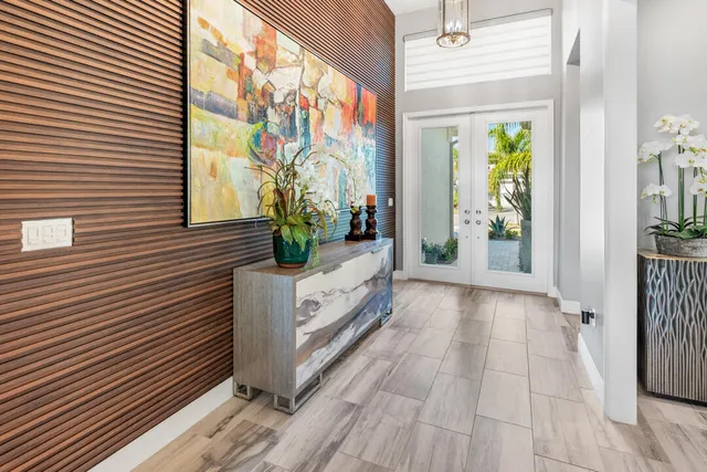 an aerial view of a house with a lake view