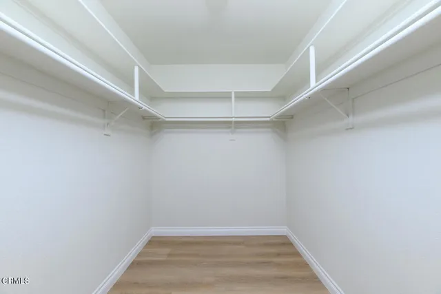 a view of an empty walk in closet