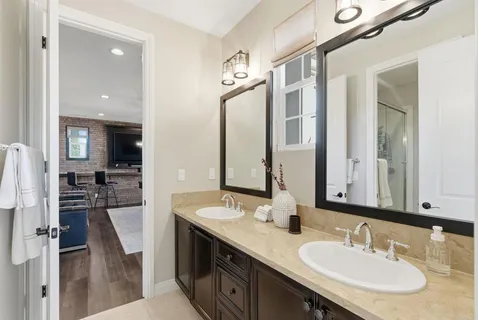 a room with furniture and a floor to ceiling window