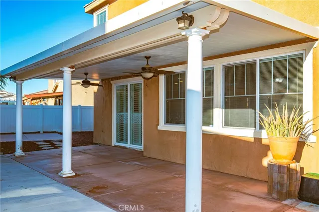 a view of a porch with seating space