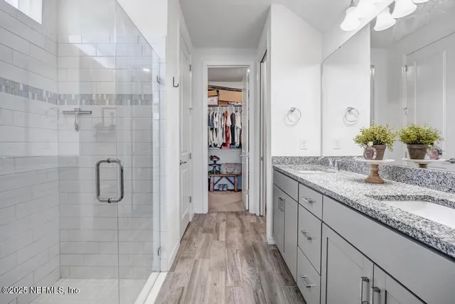 a view of a hallway with washer and dryer