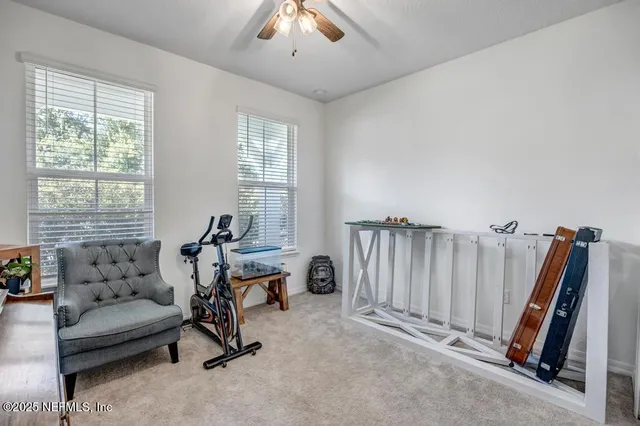 a bedroom with a bunk bed and a dresser