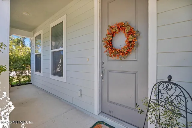 a room with a door and wooden floor