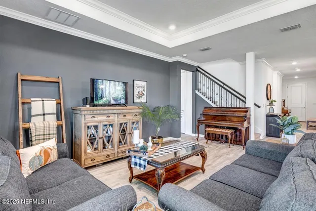 a kitchen with cabinets and stainless steel appliances