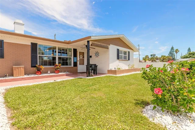 a house view with a garden space