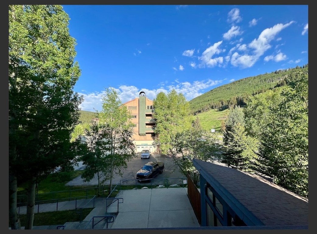 760 Copper Road, Unit E111 Copper Mountain, CO 80443 - Photo 13 of 14 a view of a balcony with an outdoor space