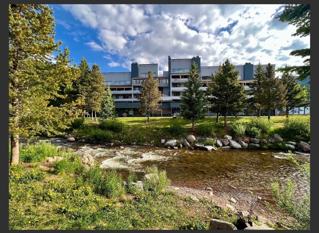 760 Copper Road, Unit E111 Copper Mountain, CO 80443 - Photo 14 of 14 a view of a park with plants and a bench