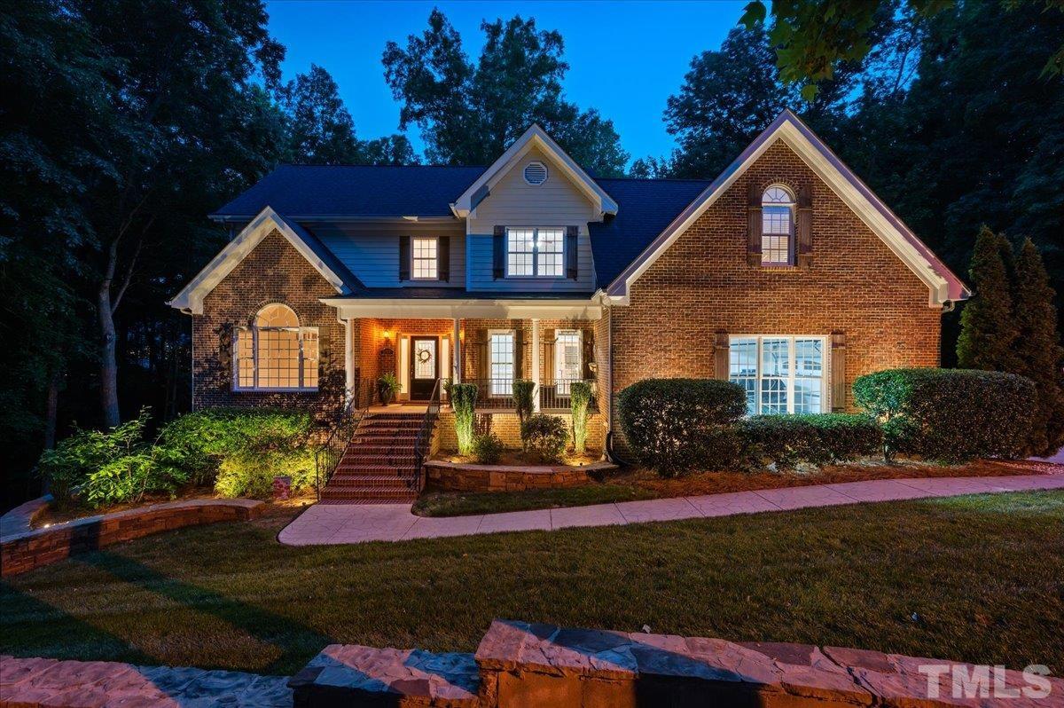 5017 Perception Lane Raleigh, NC 27613 - Photo 2 of 47 a front view of a house with yard and green space