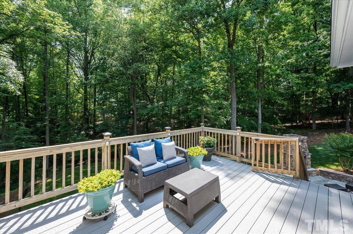5017 Perception Lane Raleigh, NC 27613 - Photo 27 of 47 a view of balcony with wooden floor and outdoor seating