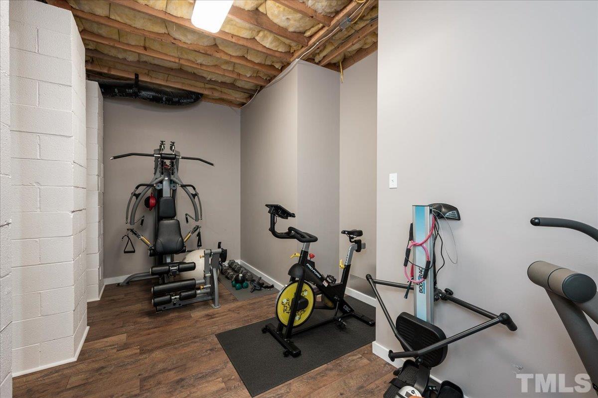 5017 Perception Lane Raleigh, NC 27613 - Photo 40 of 47 a view of a room with gym equipment