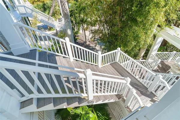 a living room with furniture a table and chairs