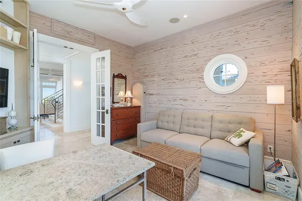 a view of a balcony with chairs