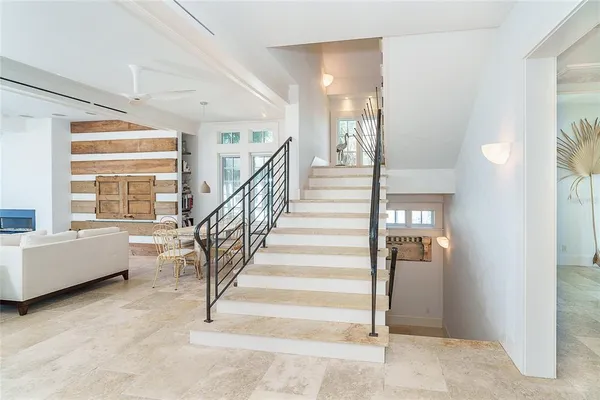 a kitchen with a table and chairs in it