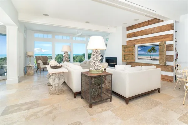 a kitchen with stainless steel appliances granite countertop a stove and a wooden floors