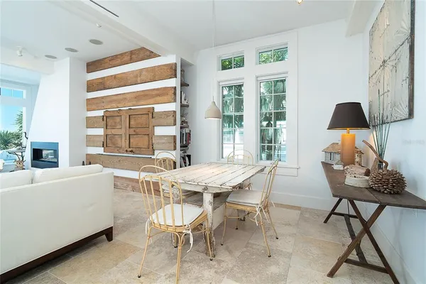 a bathroom with double vanity sink a mirror and next to a window