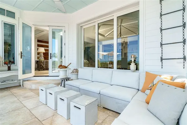 a view of living room with furniture and wooden floor
