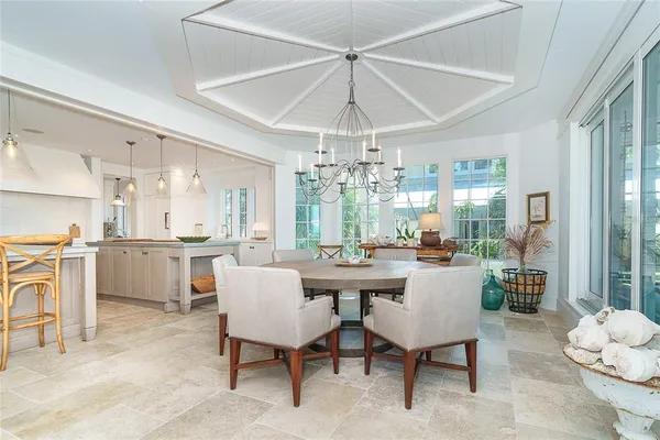 a spacious bedroom with a bed and a window