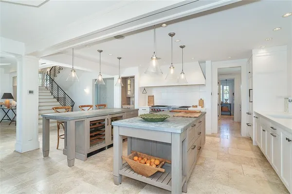 a bedroom with a bed and a table in it