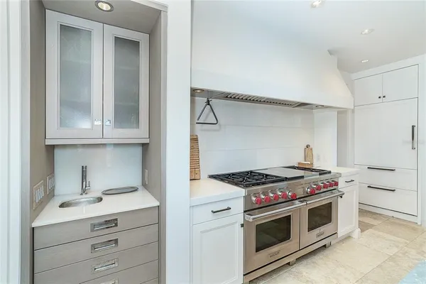 a bedroom with a bed and a cabinets