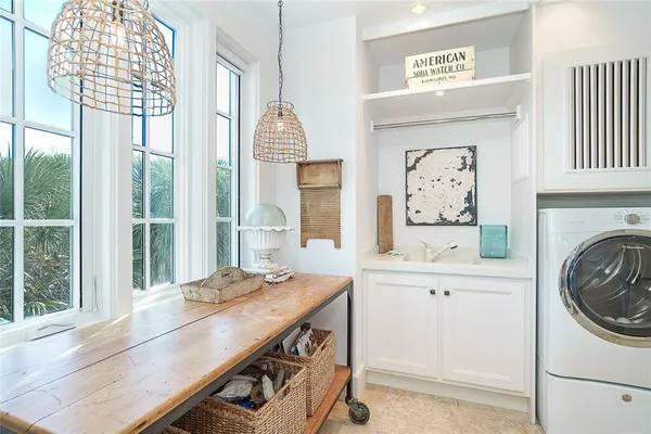 a view of a wooden chairs on the deck