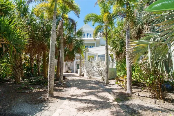 a view of a chair and table in the balcony