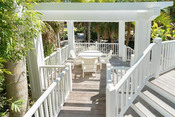 a bathroom with a granite countertop sink mirror and vanity