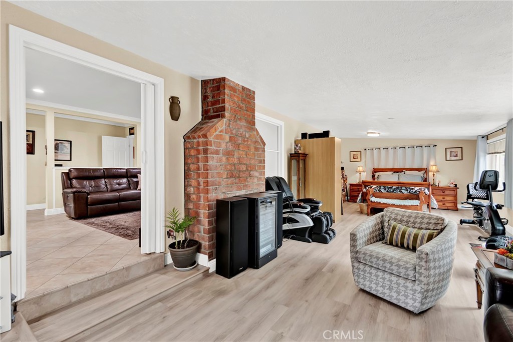 2501 Deodar Street Santa Ana, CA 92705 - Photo 21 of 43 a living room with furniture and a fireplace