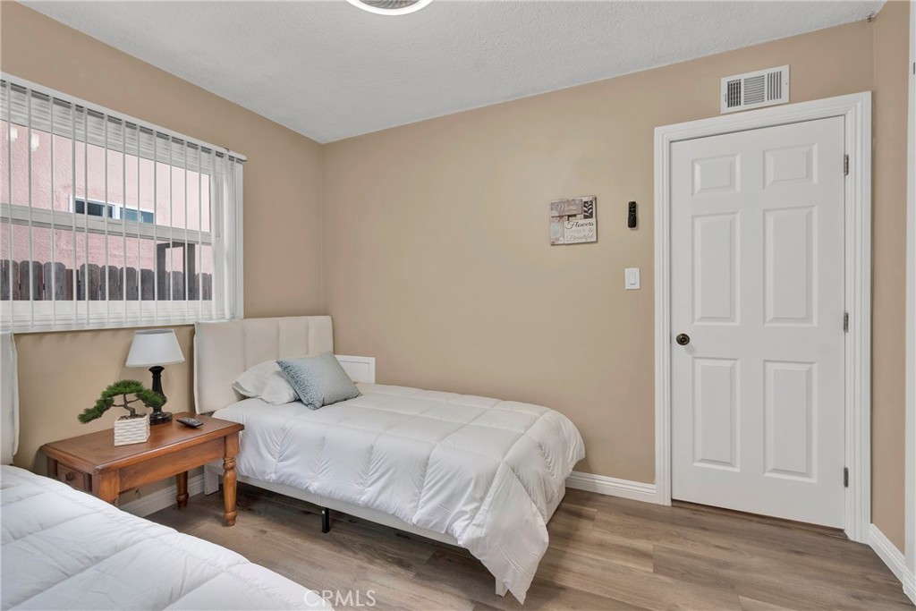 2501 Deodar Street Santa Ana, CA 92705 - Photo 24 of 43 a bedroom with a bed and a window
