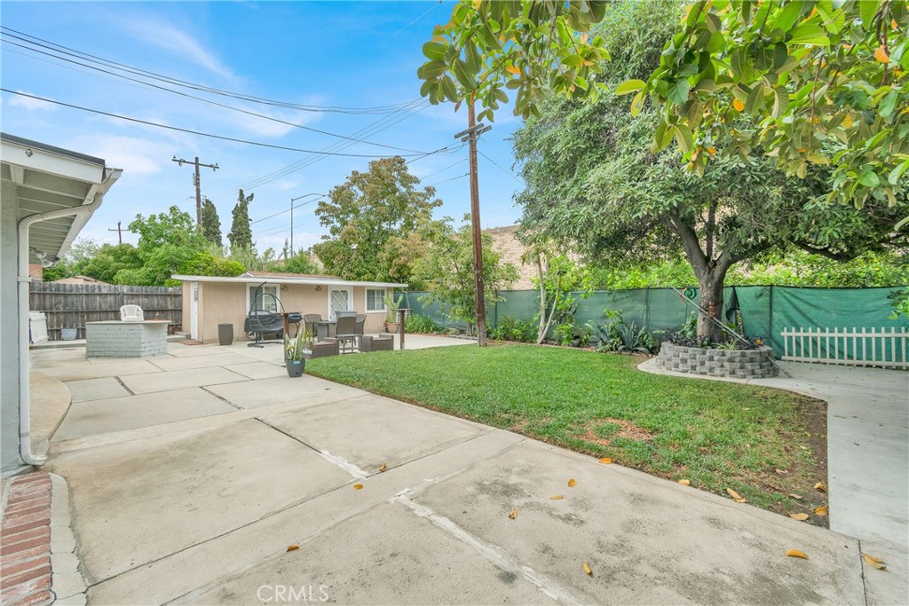2501 Deodar Street Santa Ana, CA 92705 - Photo 31 of 43 a front view of a house with a yard and potted plants