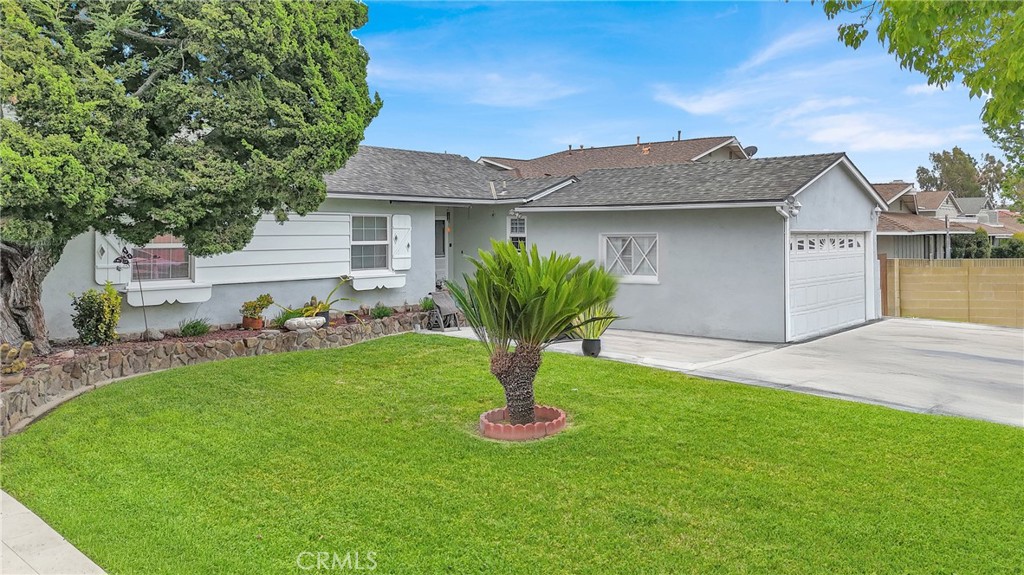 2501 Deodar Street Santa Ana, CA 92705 - Photo 4 of 43 a front view of a house with garden