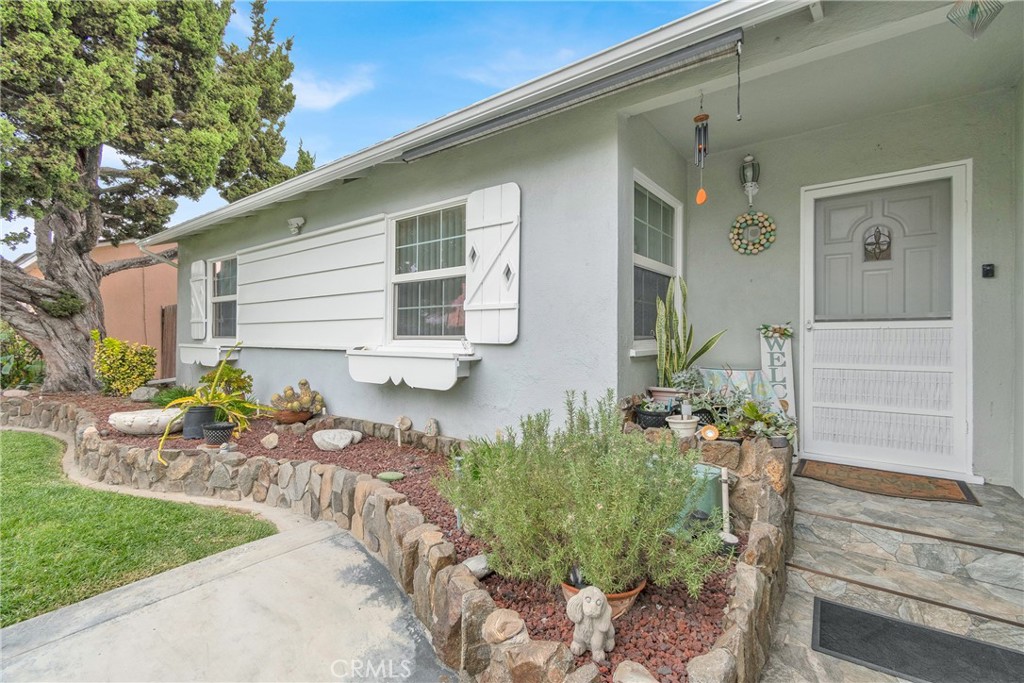 2501 Deodar Street Santa Ana, CA 92705 - Photo 5 of 43 a front view of a house with a yard