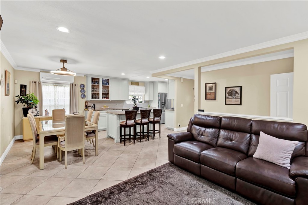 2501 Deodar Street Santa Ana, CA 92705 - Photo 6 of 43 a living room with furniture kitchen view and a wooden floor