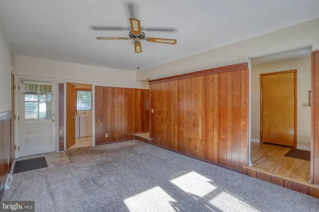 a view of an empty room and window