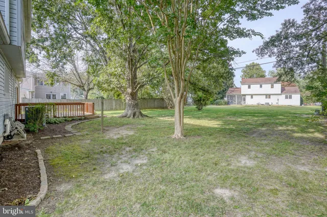 a house with trees in front of it