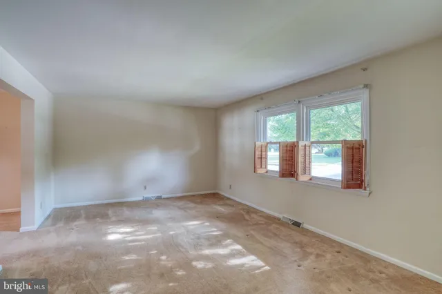 an empty room with windows