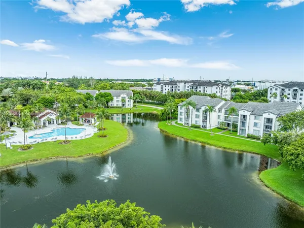 a view of a lake with a city
